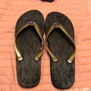 Great Condition logo Kors flip flops!